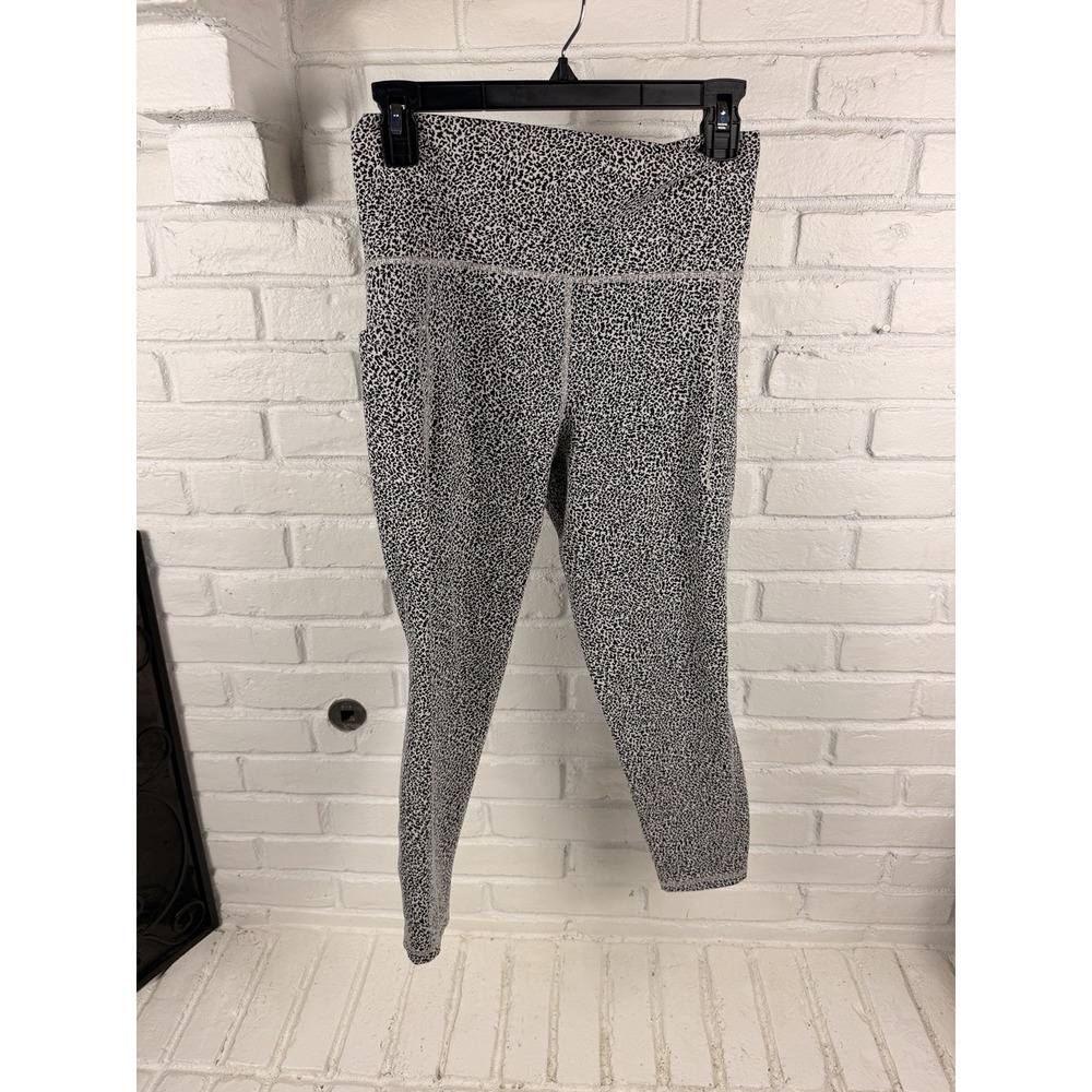 Athleta Salutation Stash II Textured Tight M Black White Animal Print Pocket